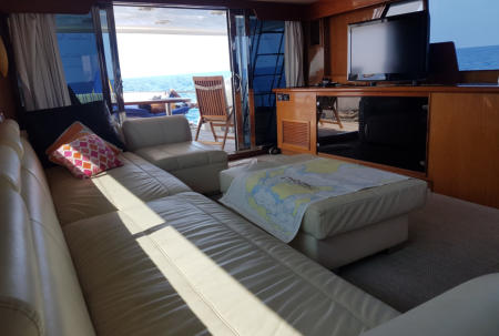 Large leather lounge for watching the day’s dives or a movie